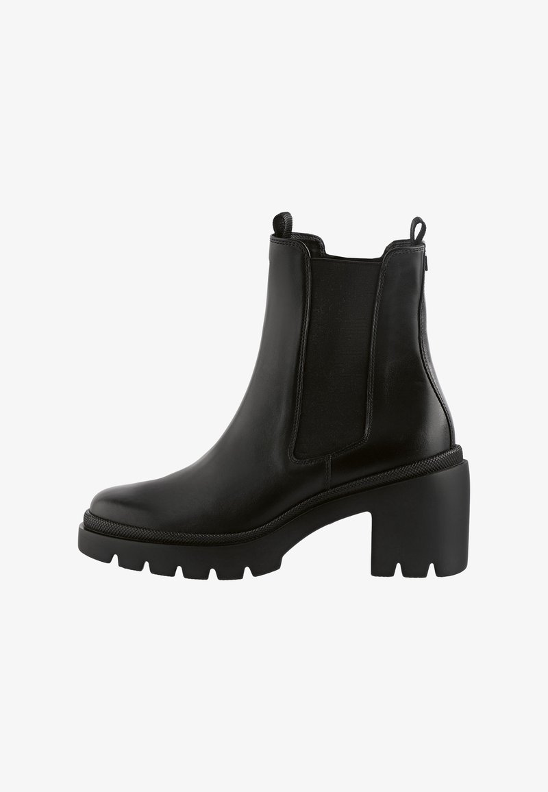 Bottine en cuir noir avec talon épais, panneaux élastiques sur les côtés, languettes de traction et semelle crantée pour une meilleure adhérence.