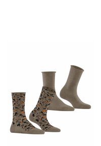 Drei Paar Socken: ein einfarbiges Beige, ein beiges Paar mit schwarzem und orangefarbenem Leopardenmuster und ein schlichtes beige Paar, alle über der Knöchelhöhe.