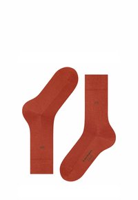 Calze in cotone terracotta con una texture liscia, lunghezza media, bordo a coste e piccolo logo sul lato.