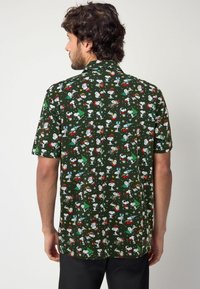 Next CHRISTMAS REGULAR FIT - Pólóing - green snoopy