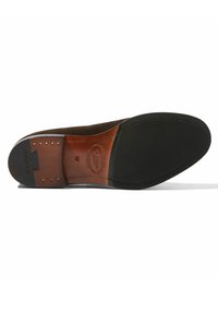 Suola di scarpa in pelle marrone con una forma liscia e arrotondata. Presenta una suola intermedia beige in contrasto e un fondo in gomma nera testurizzata per maggiore durata.