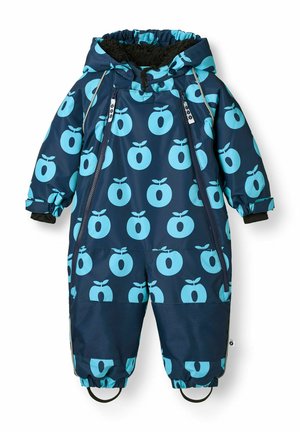 Combinaison de neige enfant bleu marine avec motif de pommes bleu clair, capuche, deux fermetures éclair à l’avant, poignets élastiques et sangles aux pieds.