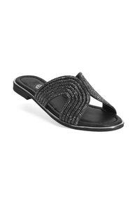 Tongs noires avec une large sangle texturée ornée d'accents scintillants. Semelle plate au design élégant et minimaliste.