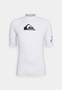 White short-sleeve rash guard with a high neck. Features a large black logo on the chest and a smaller print on the sleeve. Smooth texture.