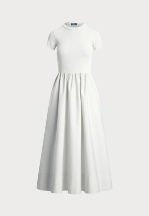 White short-sleeve dress with a round neckline, gathered waist, and full, flowing skirt; made from smooth fabric with a clean design.