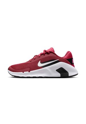 Chaussure de running Nike rouge avec une semelle blanche et des accents noirs, avec le logo Nike blanc sur le côté, vue du côté extérieur.