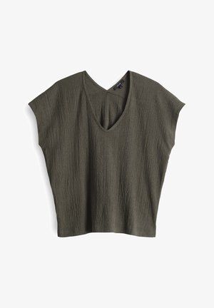 Haut olive vert à manches courtes présentant un design texturé et froissé, avec un col en V. Tissu léger avec une coupe décontractée et ample.