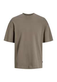 Tričko s krátkým rukávem v olivově zelené barvě, vyrobené z měkké bavlny, s kulatým výstřihem a uvolněným střihem, s minimálními švy na okrajích.