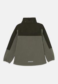Green jacket featuring a high collar, contrasting dark green shoulders, elastic cuffs, and a reflective stripe along the hem.