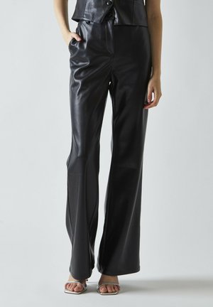 FLARED - Pantalon classique - black pu