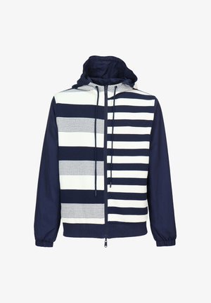 Kapuzensweatjacke in Marineblau und Weiß mit horizontalen Streifen und durchgehendem Reißverschluss. Das Material wirkt glatt; die Ärmel sind an den Bündchen gerafft.
