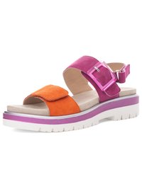 Open-toe sandal with orange front strap, pink ankle strap with buckle, beige footbed, and white sole with pink trim.