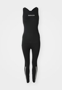 Zwarte jumpsuit met een ronde halslijn, voorzien van een wit Calvin Klein-logo. Het heeft een getailleerd ontwerp en witte zijstrepen op de benen.