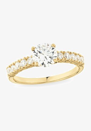 Bague en or avec un grand diamant rond au centre, entouré de petits diamants sur l'anneau, le tout dans une finition polie.