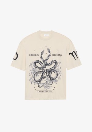 Bež majica kratkih rukava s centralnom crnom zmijom koja je okružena cvjetnim elementima i tekstom. Klasični dizajn s okruglim izrezom.