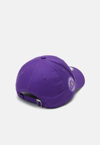 Purple baseball cap with embroidered Los Angeles Lakers logo on the back, adjustable strap, cotton material, and rounded shape.