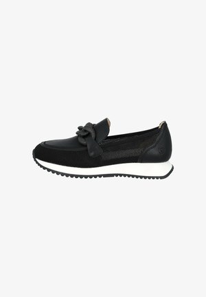 Black mesh slip-on shoe featuring a decorative bow, leather accents, a white sole, and textured grip. Low profile design with rounded toe.