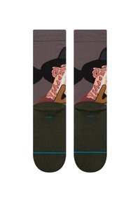 Calcetines coloridos con un diseño gráfico de una mano y comida. Parte superior de color gris claro con puntera y talón en verde oscuro, acentuados por una línea azul.