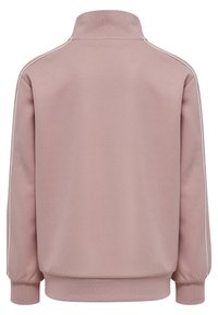 Rosa sportjacka med hög hals, långa ärmar och vita sidostreck. Tillverkad av mjukt, slätt tyg med ribbade ärmslut och nederkant.