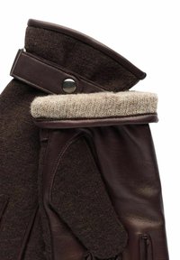 Bruna läderhandskar med en ullkrage, som har en texturerad brun tyg och en metallknäppning. Designen inkluderar en slimmad form och en slät yta.