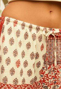 Next WIDE LEG  - Housut - red ecru tile print