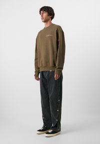 Don't Waste Culture MASON UNISEX - Loose fit -farkut - washed black