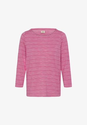 Haut à manches longues rose avec un motif en grille, un col rond et un tissu doux, conçu pour le confort et la liberté de mouvement.