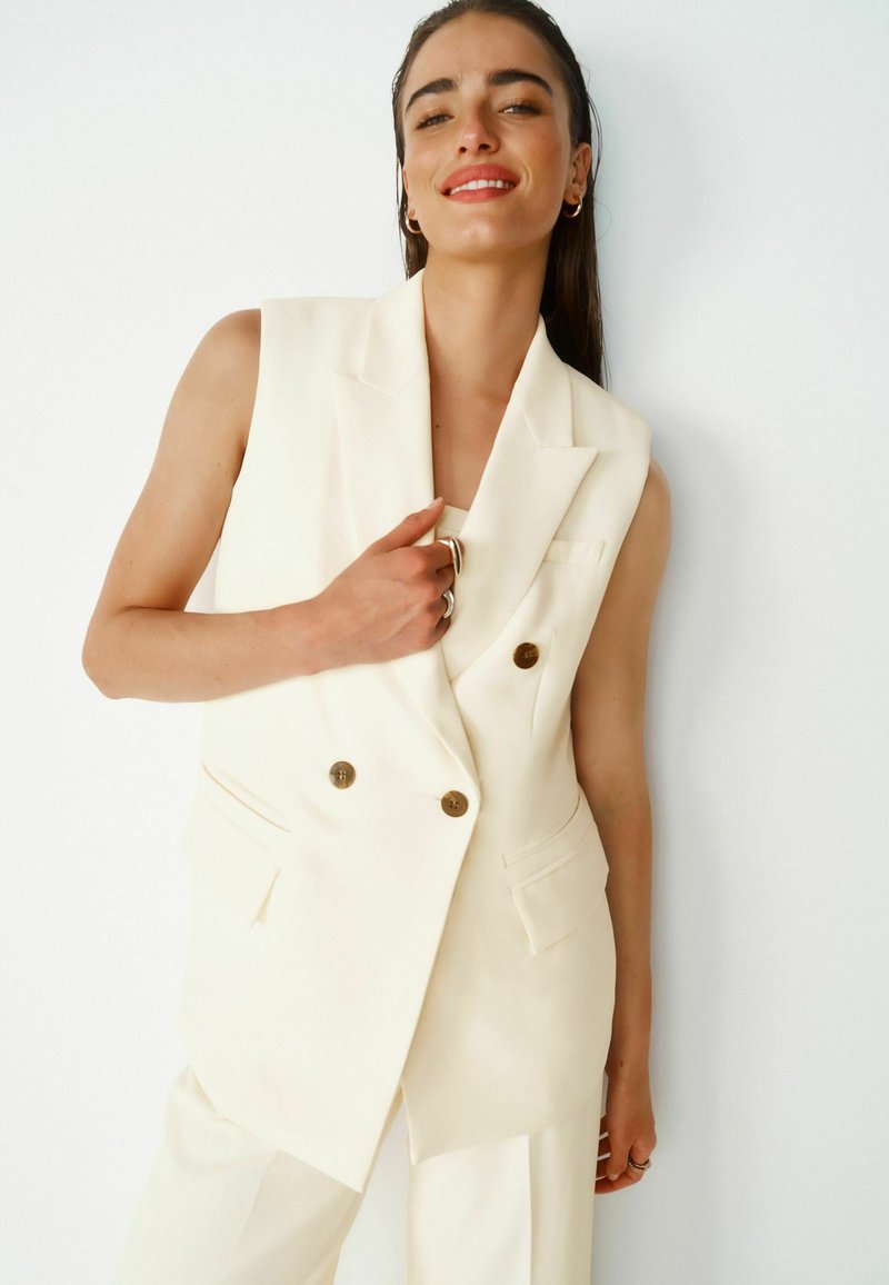 Next Vest - ecru