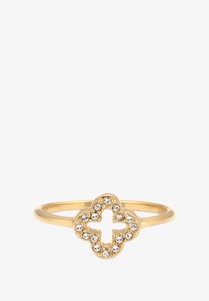 Bague en or avec un design en forme de trèfle serti de cristaux transparents, dotée d'un anneau lisse et d'une finition polie.