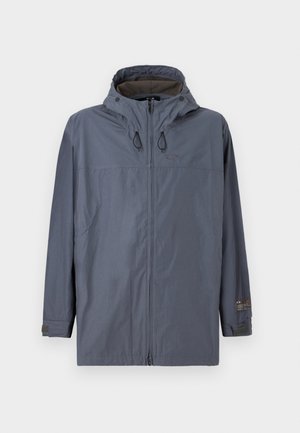 Veste coupe-vent grise avec une capuche, fermeture zippée à l'avant, poignets élastiques et intérieur texturé. Comprend des cordons de serrage à la capuche et un détail de logo.