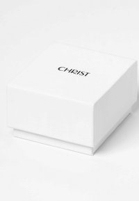 Weißer quadratischer Schmuckkasten mit matter Oberfläche, mit einem schwarzen, aufgedruckten "CHRIST"-Logo auf der Oberseite und einem glatten, nahtlosen Design.