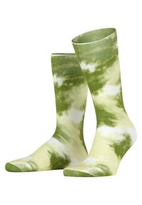 Grüne Batik-Socken in Knöchelhöhe mit einem Farbverlauf-Muster, hergestellt aus weichem, dehnbaren Material und mit gerippten Bündchen für einen sicheren Sitz.