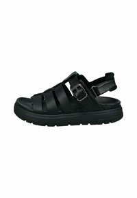 Schwarze Leder-Sandale mit mehreren Oberriemen, verstellbarem Schnallenverschluss, hinterem Slingback und einer dicken Gummisohle mit strukturiertem Profil.