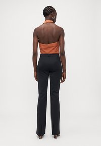 ONLY Tall ONLPEACH LIFE FLARED  - Trousers - black