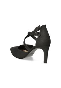 Scarpa nera con tacco alto, punta affusolata, tessuto texture e doppie cinghie incrociate. Tacco a stiletto con finitura liscia.