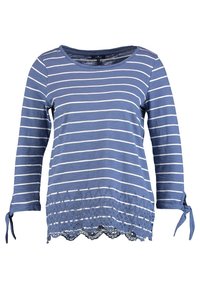 Blårandig långärmad skjorta med rundad halsringning, knutna ärmslut och en nederkant med spetsdetaljer och blommotiv.