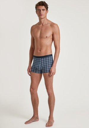 Herrenboxershorts in blauem Karomuster, aus weichem Material gefertigt, mit einem marineblauen elastischen Bund und einer eng anliegenden Passform.