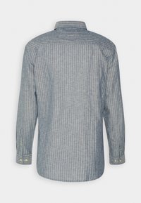 Long-sleeve shirt in blue chambray with white vertical stripes, button cuffs, and a classic collar. Smooth fabric texture, back view displayed.