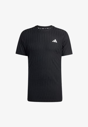 Melnas īsām piedurknēm sporta t-krekls ar teksturētu rakstu, okta v-veida kakla izgriezums un balts logotips augšējā kreisajā pusē. Izgatavots no sintētiska materiāla.