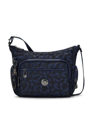 Navy blue crossbody bag with geometric pattern, multiple zippered pockets, adjustable strap, and small metallic brand emblem on front pocket.