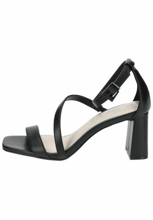 Black high-heeled sandal featuring a square toe, two front straps, and an ankle strap with a buckle. Smooth leather texture and block heel.