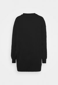 Sweat-shirt noir à manches longues et col rond, vu de dos avec poignets côtelés et ourlet droit.