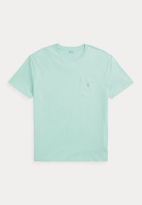 Ljus mintgrön bomull t-shirt med korta ärmar, klassisk rund halsringning och ficka på vänster bröst med en liten broderad logotyp.