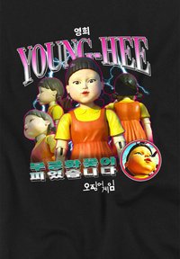 Graphic features a doll in a yellow top and red dress, with a shiny plastic finish. Black background emphasizes bold text and colorful accents.