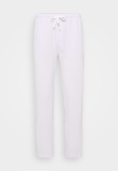 Pantalones de lounge de algodón blanco con cintura elástica, cordón de ajuste y cierre de botón. Presenta un diseño de pierna recta y una textura suave.