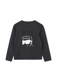 Grijze langslijfshirt met een grafisch ontwerp van een zonnebril in zwart-wit op de rug. Zachte stof, ronde hals, ontspannen pasvorm.