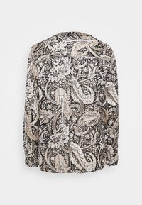 Chemise à manches longues en tissu léger, avec un motif paisley noir, beige et blanc, à coupe décontractée et texture douce.
