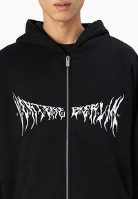 Vertere Berlin FOG ZIP HOODIE UNISEX - Cipzáras pulóver - black