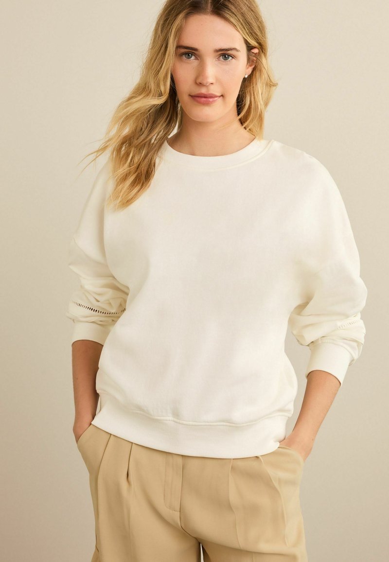 Next GRAPHIC Sweatshirt ecru white crochet sleeve detail/weiß