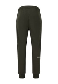 Donkergroene sweatpants met een elastische tailleband, zijzakken en elastische manchetten, voorzien van een wit logo op het onderbeen.